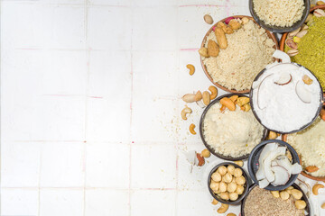 Fototapeta na wymiar Alternative nut flour. Various keto paleo gluten, grain free flour source set, natural nut-based vegan baking. Almond, coconut, brazil nut, macadamia, walnut, cashew, pistachio, hazelnut, peanut flour