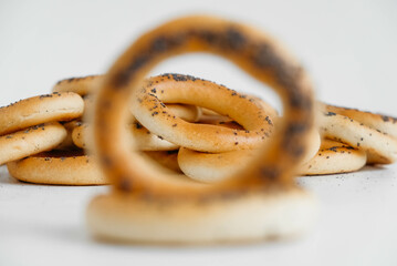 Dried bagels with poppy seeds on a white background