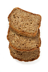 pieces of home made rye bread isolated on white background