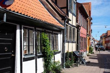Fototapeta na wymiar Houses in the aincient town of Elsinore - Helsingor, Denmark. Colorful houses and ols city streets. popular tourist place. High quality photo