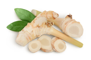 Fresh galangal root with slices isolated on white background with clipping path and full depth of field. Top view. Flat lay
