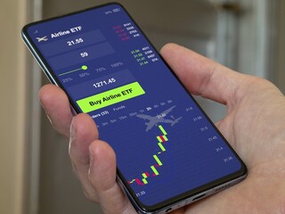 Stock world exchange market chart, Stock market data on smartphone. Business analysis of a trend. Airline ETF