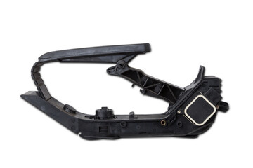 Obraz premium Gas pedal on a white isolated background in a photo studio for sale in a car service. Black auto part for replacement during repair in the workshop. Spare part junkyard