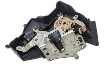 Obraz premium Detail of a car spare part made of black plastic and metal - door lock separately isolated on a white background. Repair in a car workshop, equipment for sale