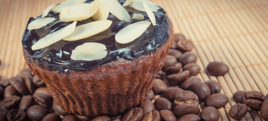 Fresh muffins with chocolate, coffee and dried sliced almonds. Dessert for different occasions