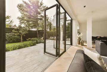 Terrace of house with opened doors