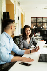 Colleagues arguing in office. Angry businesswoman yelling at her collegue.