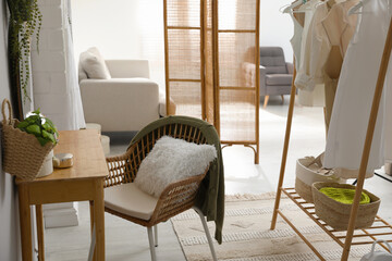 Wooden dressing table with decorative elements in room