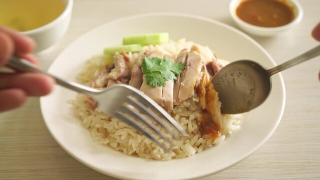 Hainanese Chicken Rice or steamed rice with chicken - Asian food style