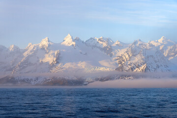 Snow covered mountains on South Georgia West coast, South Georgia and the Sandwich Islands, Antarctica