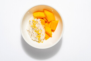 .Thai style sticky rice with banana cream and mango