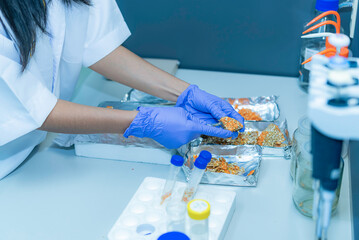 Thai women scientists the preparation for scientific experiment in the laboratory.