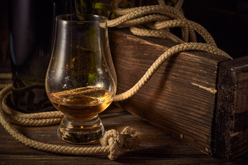 Obraz na płótnie Canvas Glencairn whisky glass on a wooden background
