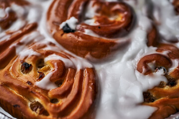 Freshly baked cinnabon pie with white cream
