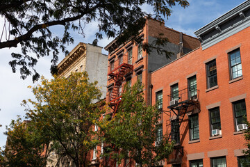 Row of Old Brick Residential Buildings along a Street in Greenwich Village of New York City
