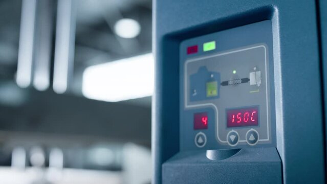 Technological factory indicator display showing production data close up