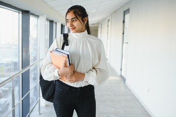 beautiful indian university student. The concept of higher education.
