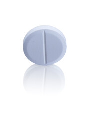 Medical pill close-up on a white background with reflection