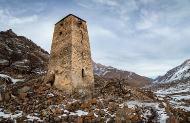 Ancient towers of Upper Balkaria in the winter in the snow