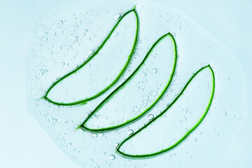 Aloe Vera slices with aloe gel. Natural cosmetics background for design.