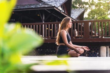 Outdoor meditation and yoga practice at sunset or sunrise.