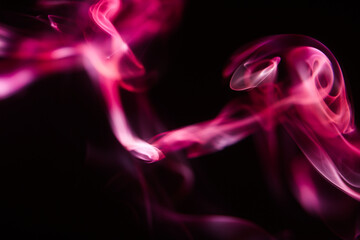 Beautiful red and pink puffs of smoke
