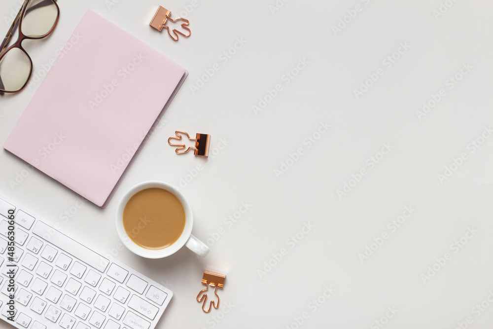 Poster desktop. notepad keyboard cups of coffee glasses on the table. top view flat lay copy space
