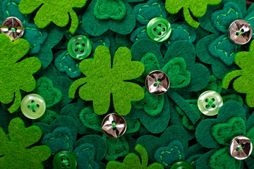 Handmade clover leaves flat lay background