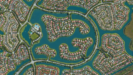 Weston, Florida, settlement of the wealthy district with water channels, looking down aerial view...