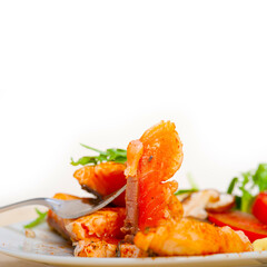 grilled samon filet with vegetables salad
