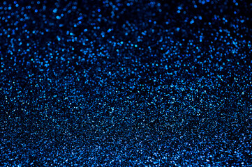 Obraz premium Deep Blue,white and white colors abstract light background, Blue shining lights, sparkling glittering ,winter,Christmas lights. Blurred abstract holiday background.