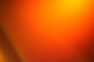 Photo image blurred Abstract colorful light of the night background. Summer backdrop or warm ,hot color abstract yellow,orange,colorful wall paper associated with sun and fire.