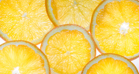 Yellow orange rings on a white light background. Background with citrus fruits.