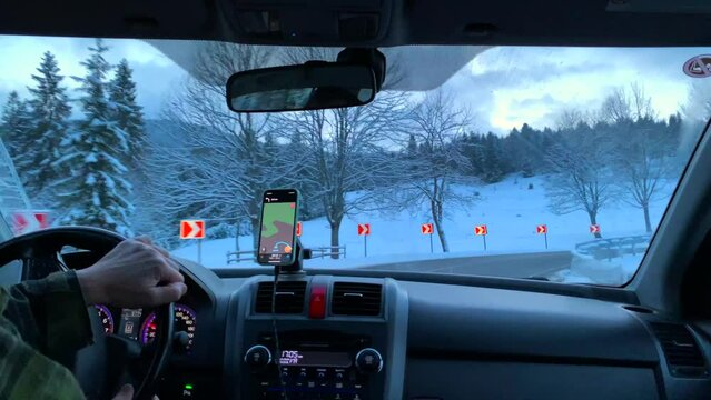 Beautiful view of the winter Carpathians from a moving car, Ukraine.