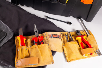 Set of construction tools for repair and installation on a white background. Service banner for plumber or repairman