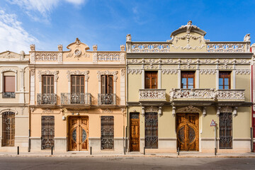 Fototapeta na wymiar Beautiful Valencian art nouveau buildings in Alfafar, Valencia, Spain. 