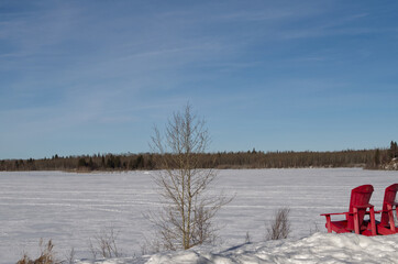 Red Chairs before Frozen Astotin Lake