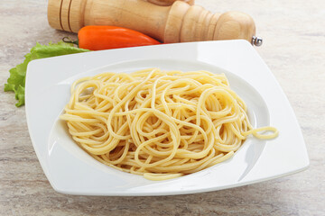 Italian pasta boiled spaghetti with oil