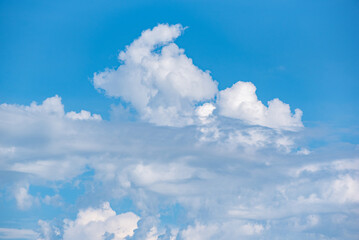 Naklejka na ściany i meble Beautiful clouds in the european summer sky.