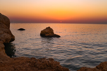 Fototapeta na wymiar Sunset at the sea in summer