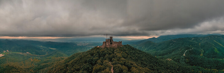 Aerial view of Castel de Montsoriu, a medieval and gothic stronghold on hilltop, Girona, Spain.