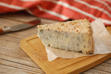 Cabrales, spanish blue cheese on rustic background