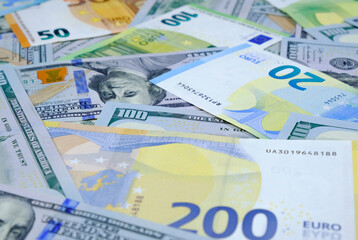 Money. Euro and us dollars banknotes. Background of dollars and european currency