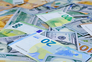 Money. Euro and us dollars banknotes. Background of dollars and european currency