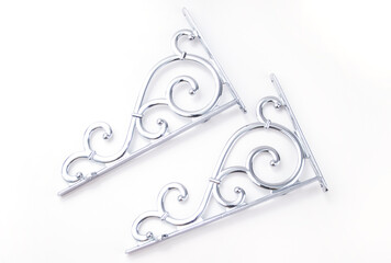 Decorative bracket. Decorative metal bracket for flowers. Holder for bedside shelves