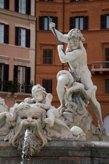 Neptune battling with the huge octopus.  Baroque fountain in Rome, Italy. © Enchanting Odyssey