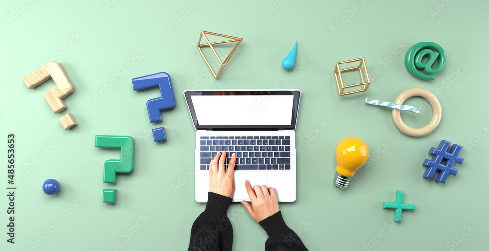Poster question marks and geometric shapes with person using a laptop computer from above