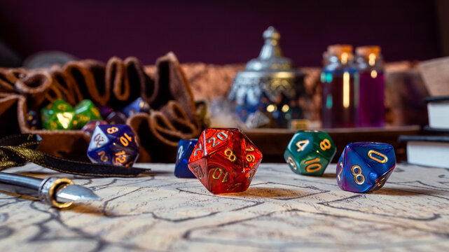 Close-up of a red d20  and d10
