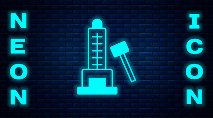 Glowing neon High striker attraction with big hammer icon isolated on brick wall background. Attraction for measuring strength. Amusement park. Vector