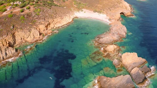 4k drone flying over footage (Ultra High Definition) of Exo Kapi beach. Colorful outdoor scene of Peloponnese peninsula, Greece, Europe. Depp blue Mediterranean sea.